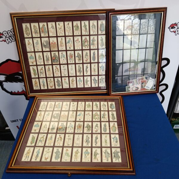 Framed vintage John Player character cigarette cards, collectible ephemera.
