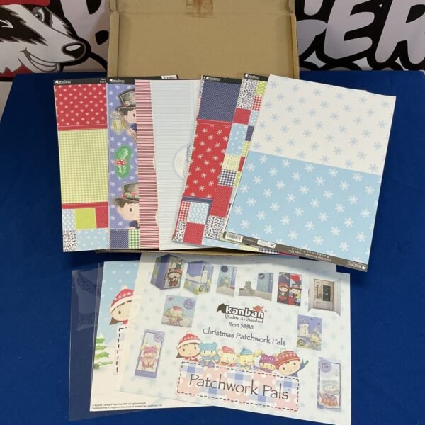 Kanban Patchwork Pals Christmas kit with patterned papers and embellishments.