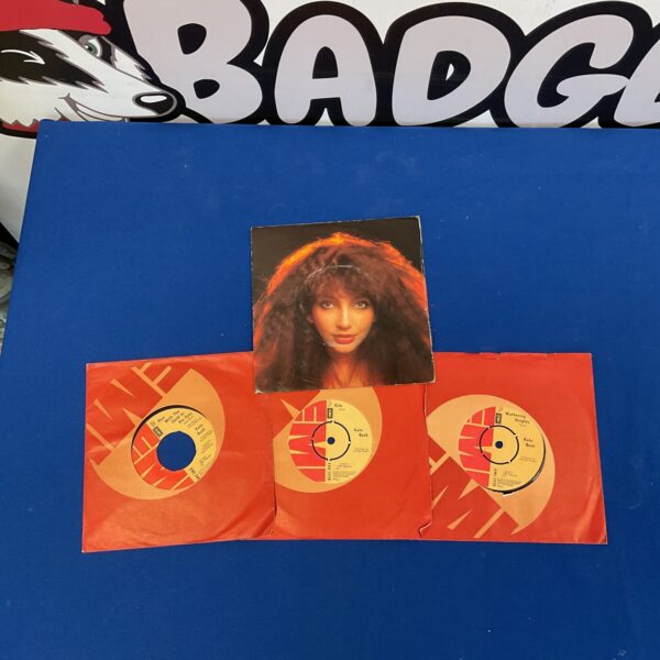 Kate Bush singles collection, vintage vinyl records from the 1980s.