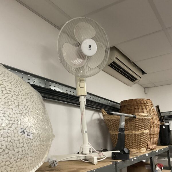 White Kingavon pedestal fan presented for auction.