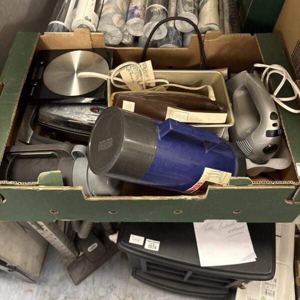 Mixed kitchenware lot with stainless steel utensils and a hand blender.