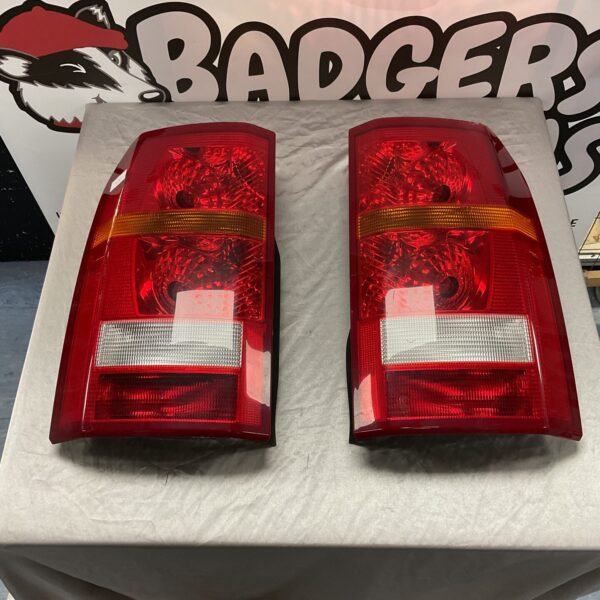 Pair of used Land Rover Discovery rear light clusters.