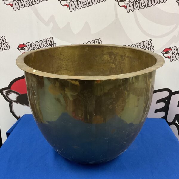 Large brass boiler pot planter for garden or home decor.