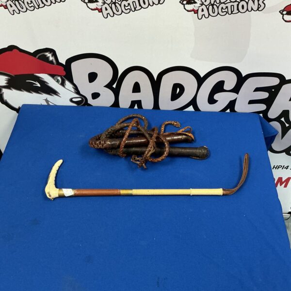Vintage leather whips and riding crop lot for equestrian use.