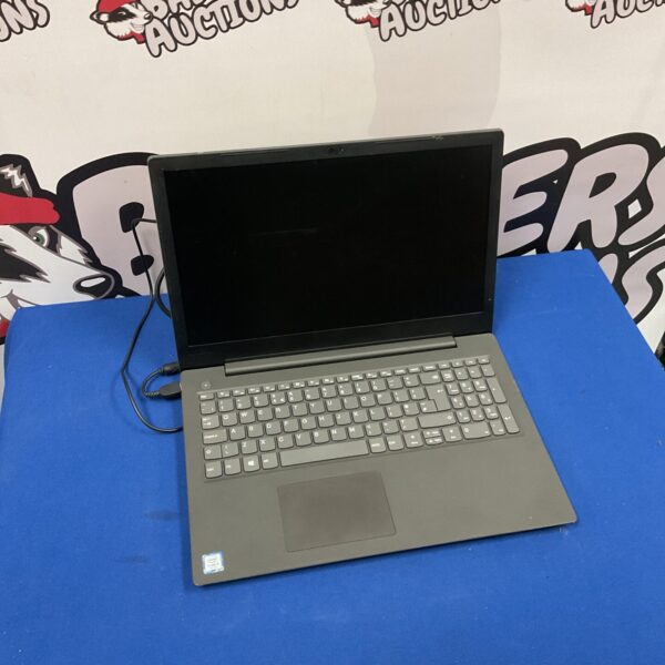 Black Lenovo V130 laptop open on a surface.