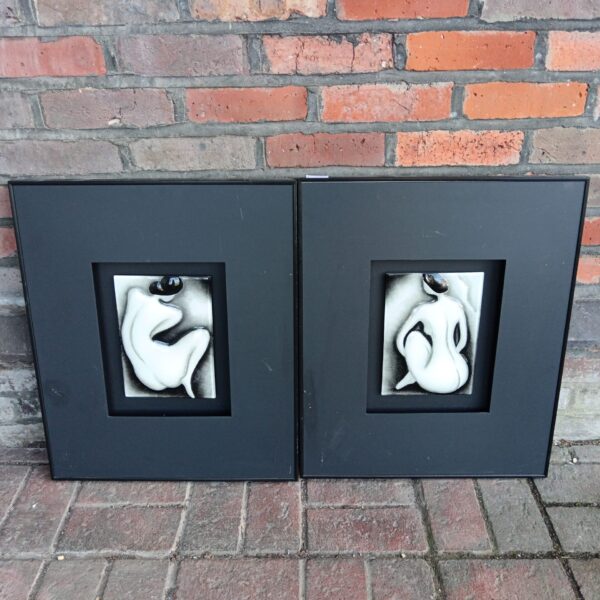 Pair of framed Li Zi Ying glass artworks depicting seated ladies.