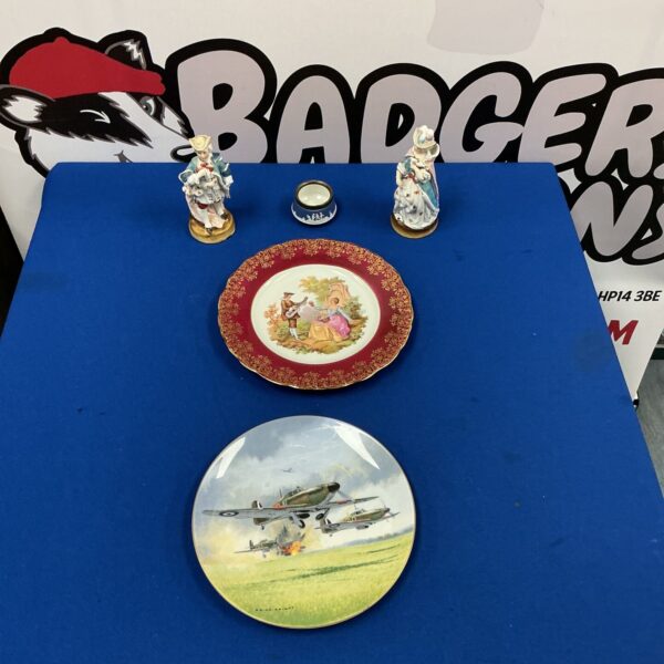 Vintage Limoges porcelain plate with delicate floral decoration.