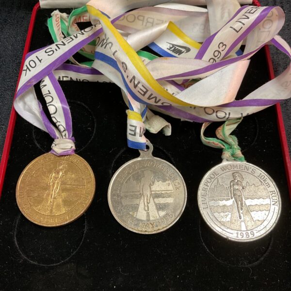 Lot of three Liverpool Women's 10k marathon medals for collectors.