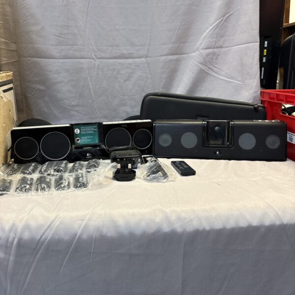 Two Logitech iPod speaker docking systems for portable audio.