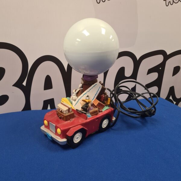 Retro 1998 Looney Tunes lamp with cartoon vehicle base.