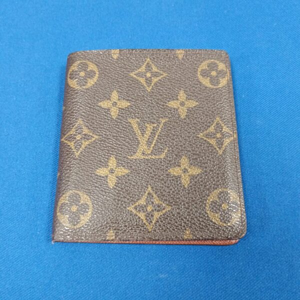 Front view of a vintage Louis Vuitton style wallet.