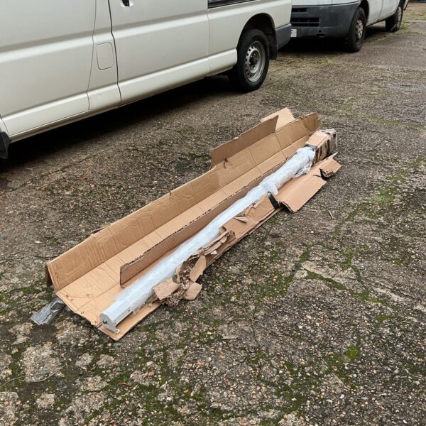 Luxberg electric projector screen in storage