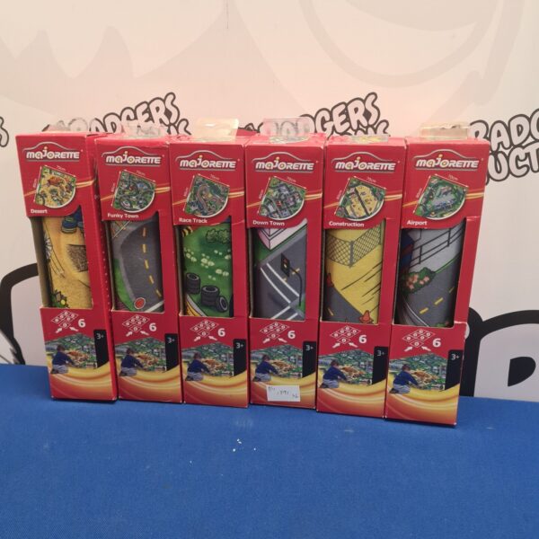 Boxed lot of six vintage Majorette play mats for toy cars.