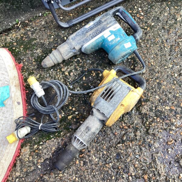 Makita and Dewalt concrete breakers for demolition work.
