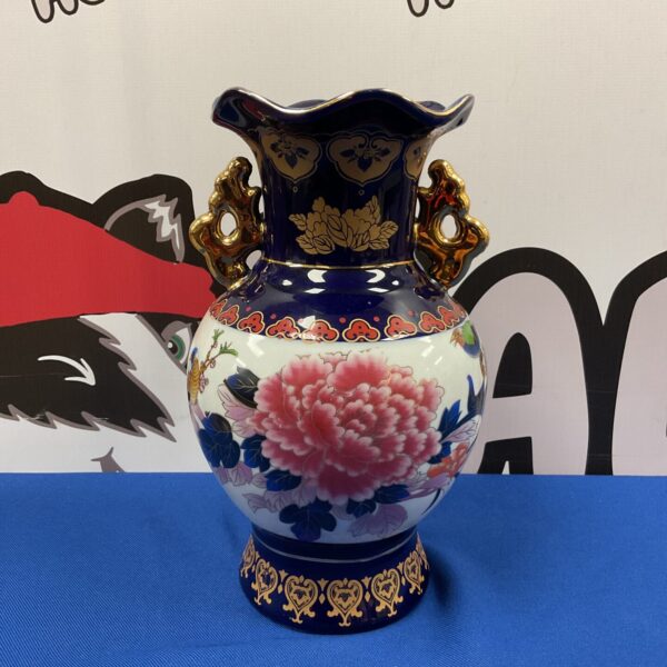 Vintage Mandalay cobalt blue vase with bird of paradise design.
