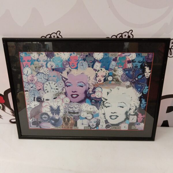 Vibrant Marilyn Monroe pop art print in a black frame.
