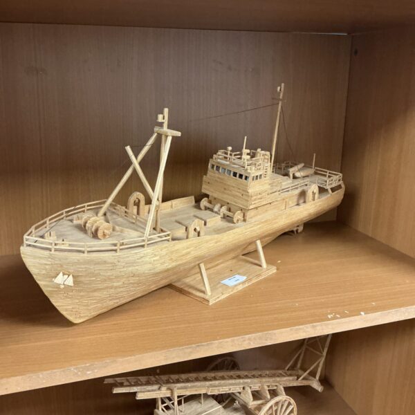 Detailed handmade matchstick boat model, folk art collectible.