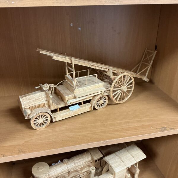 Detailed handmade matchstick fire engine model, folk art collectible.