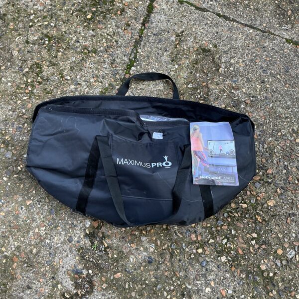 Dark grey Maximum Pro fitness suite cover with drawstring closure.