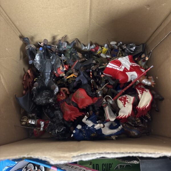 Vintage medieval knight toy lot with horses and figures.