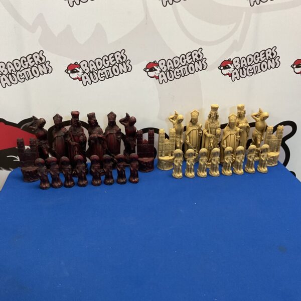 Intricate medieval style resin chess pieces set for collectors.