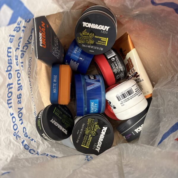 Mixed lot of men's hair products including Toni & Guy styling wax.
