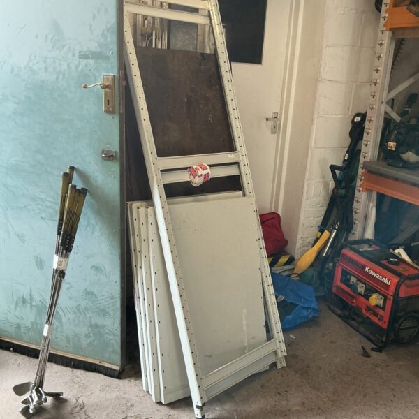 Galvanized metal shed panels for garden storage and DIY projects.