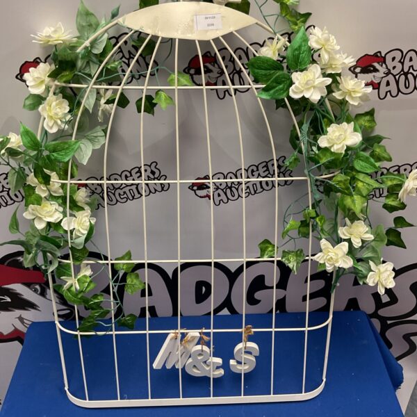 Vintage metal wire birdcage for wall hanging decor.