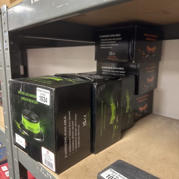 Green micro LED magnetic beacon light, close-up view.