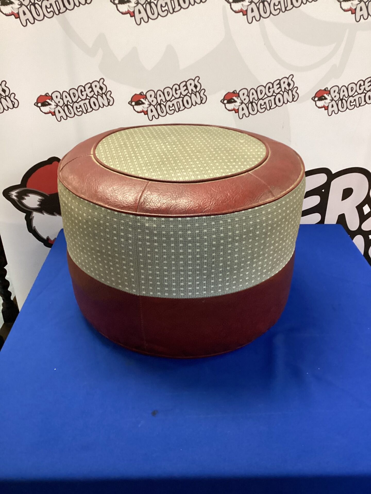 Vintage mid century leather footstool in brown.