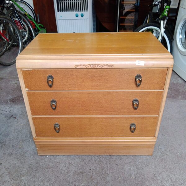 Vintage mid-century teak chest of drawers with four drawers.