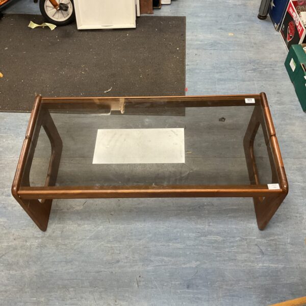 Mid-century teak coffee table with smoked glass top.