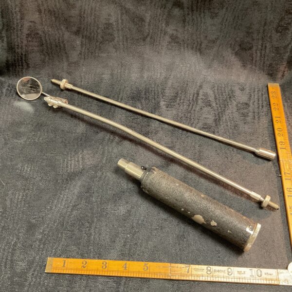 Vintage military illuminated probe with extension rods.