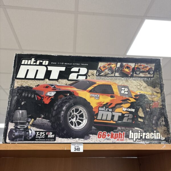 Boxed Mitro Mt 2 RC car, 1/10 scale nitro model.