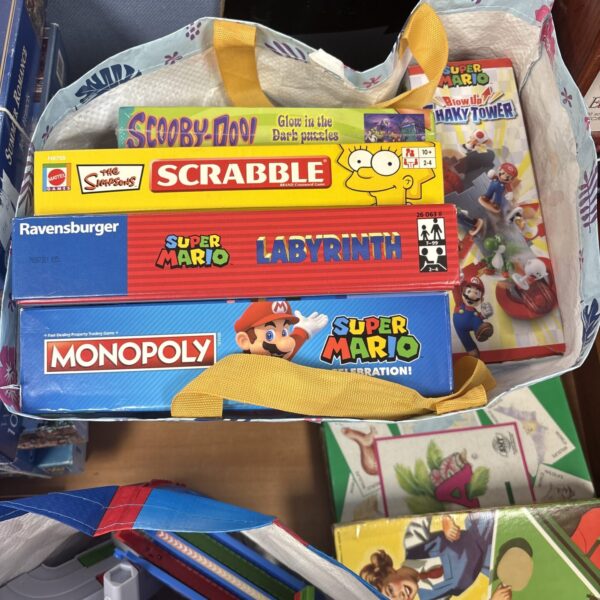 Mixed lot of board games including a Super Mario game.
