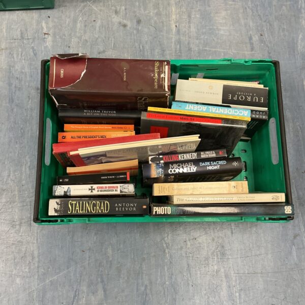 Mixed book lot featuring a copy of Shakespeare and vintage novels.