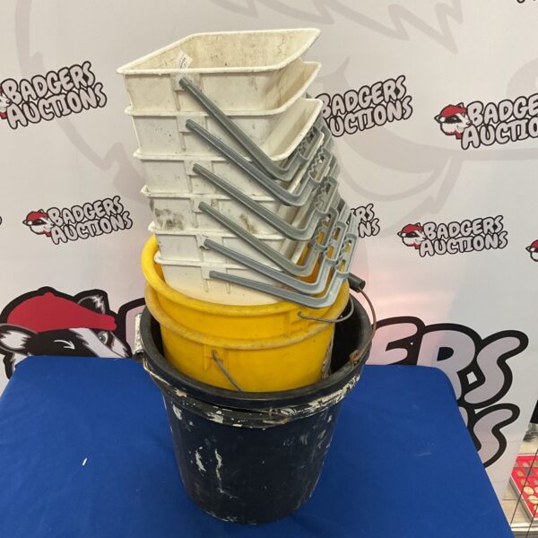 Assorted plastic buckets in a mixed lot for storage and utility.