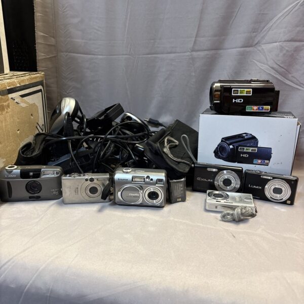 Mixed camera lot including Canon, Casio, and Panasonic models.