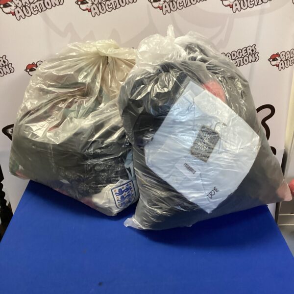 Two large bags filled with a mixed clothing lot.