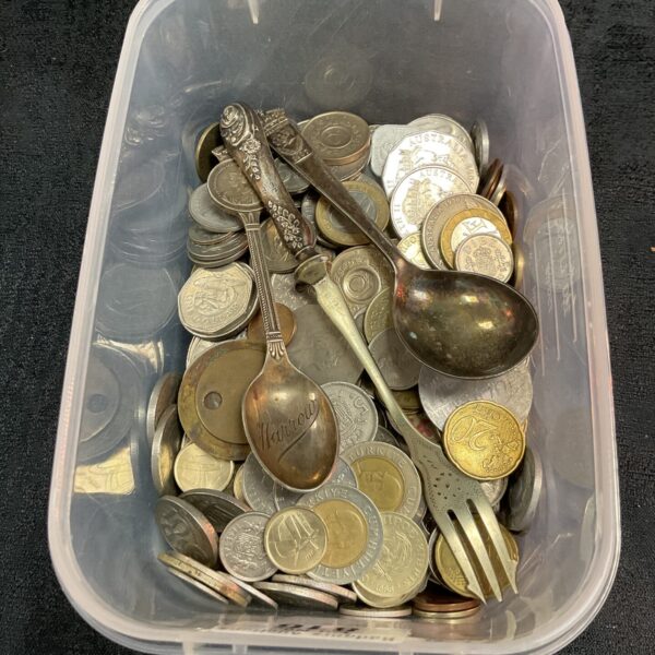 Mixed lot of vintage coins and silver plated spoons for collectors.