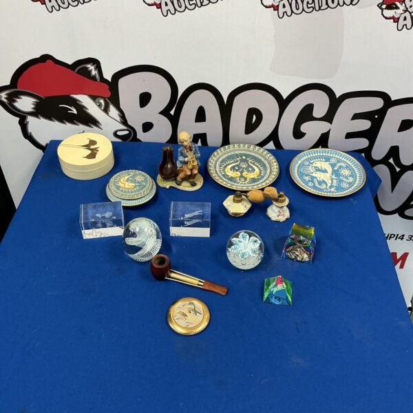 Mixed collectibles lot featuring a glass paperweight and vintage curios.