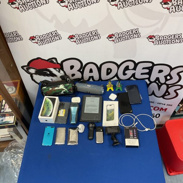 Mixed electronics lot including iPods, Kindle, and iPhones for repair.