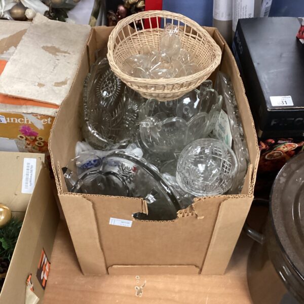 Mixed glassware lot including cut glass fruit bowls and vintage dishes.