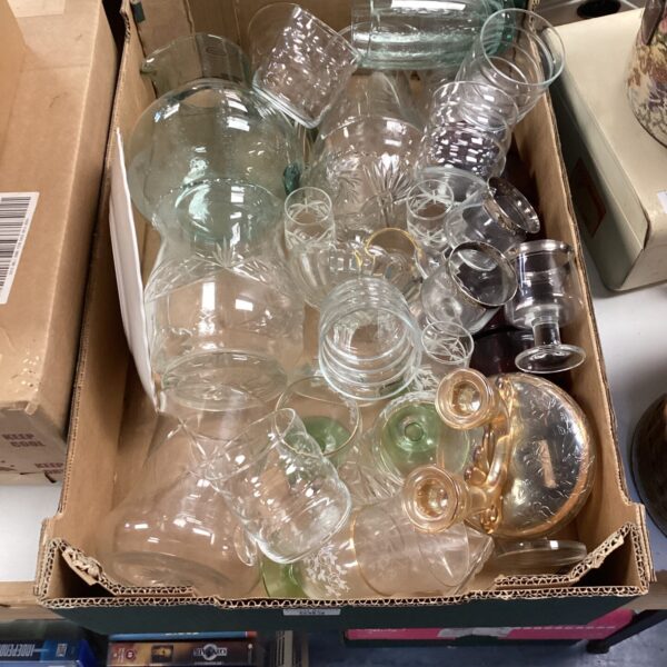 Mixed glassware lot with assorted drinking glasses and barware.
