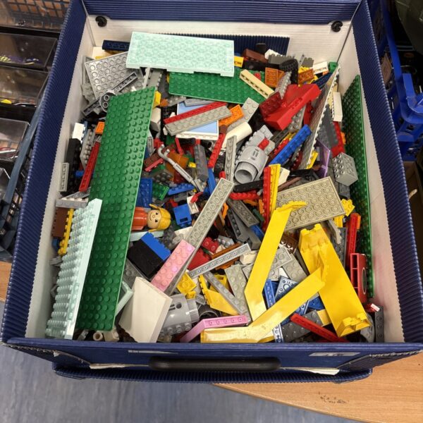 Large lot of mixed Lego bricks for building and play.