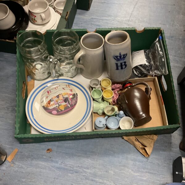 Mixed lot of vintage collectibles including steins and ceramics.