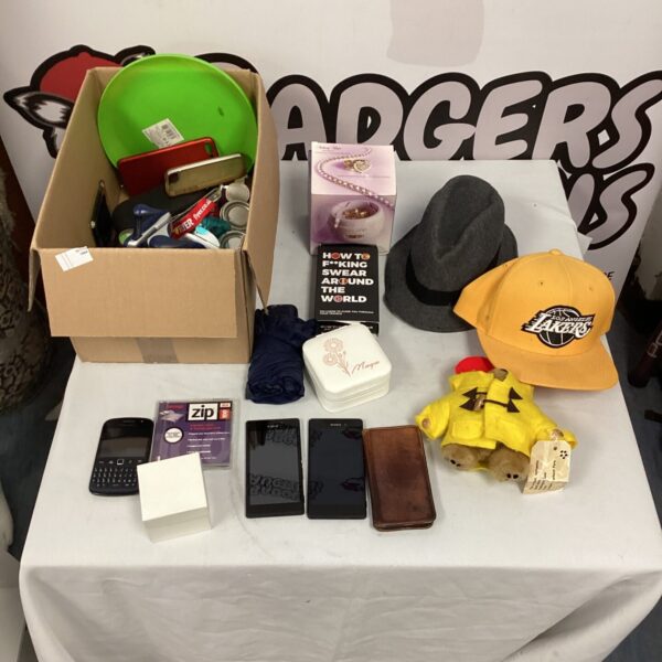 Mixed lot of phones and hats from house clearance.
