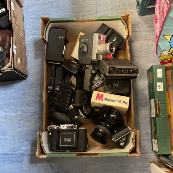 Mixed lot of vintage cameras including Polaroid, Minolta, and Olympus.