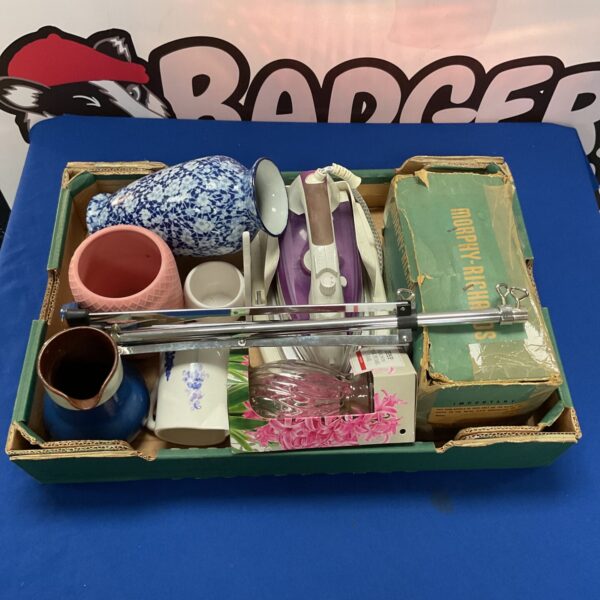 Mixed lot of vintage items including glass vases and irons.