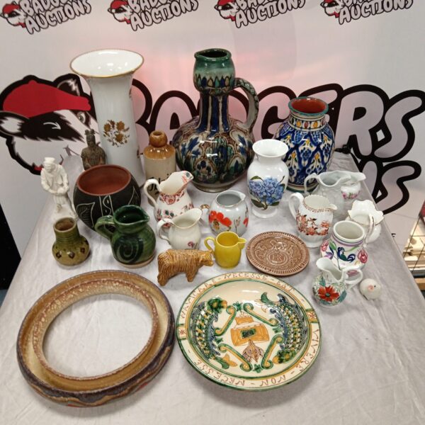 Mixed lot of vintage pottery and china, including Poole and Wade pieces.